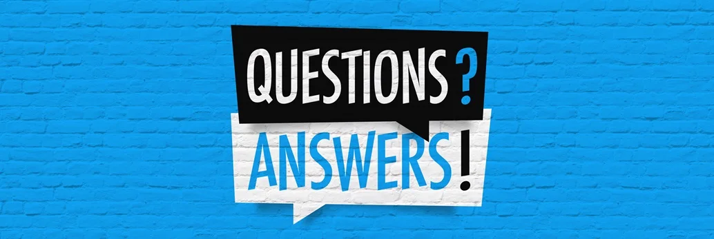 Black and white speech bubbles with 'Questions?' and 'Answers!' text on a blue brick wall background for an article on Voice Search Optimization FAQs